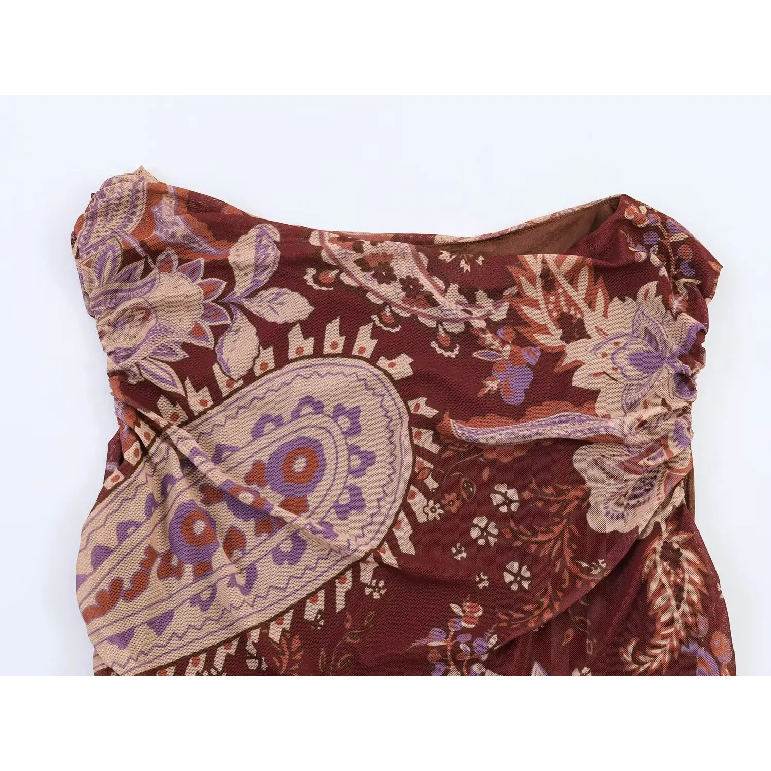 Close‑up of cowl neck and side ruched detail on burgundy paisley mesh maxi dress