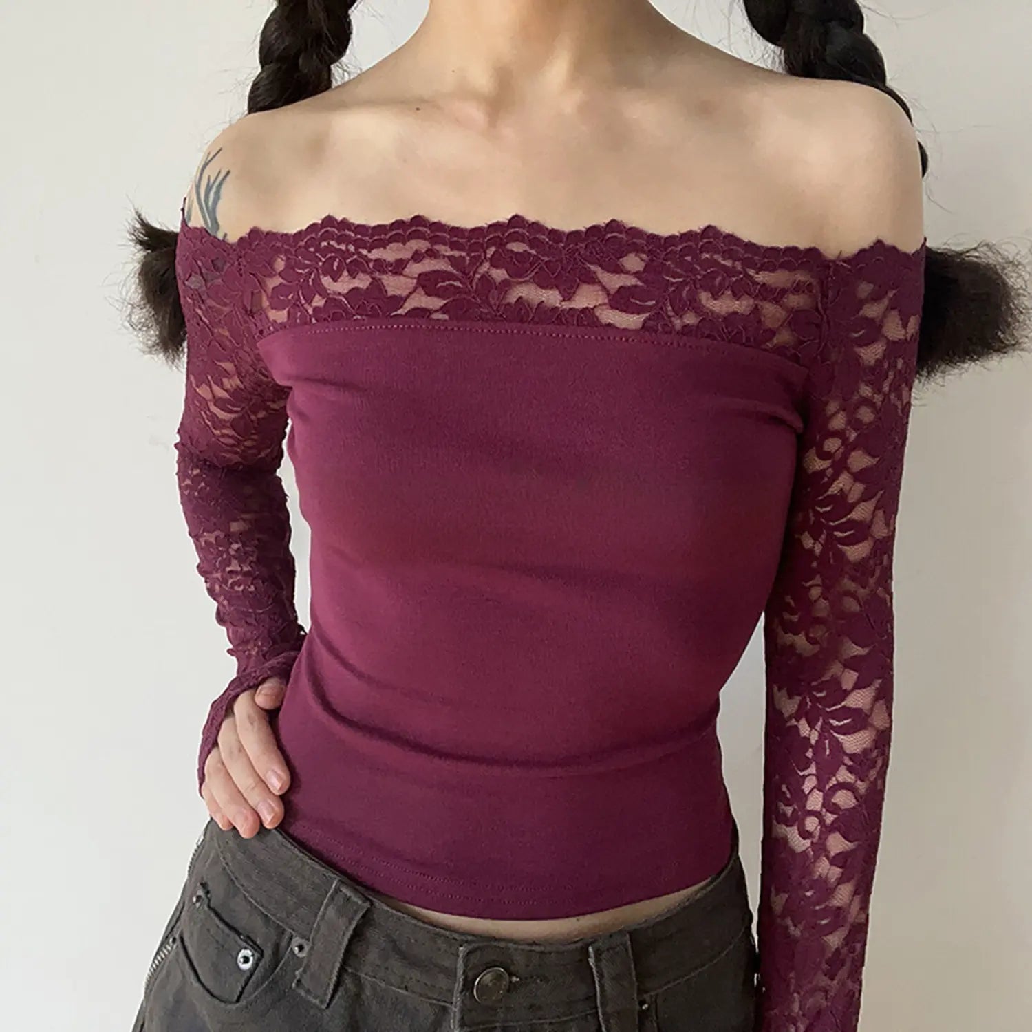 Model front pose burgundy wine off‑shoulder floral lace long sleeve crop top