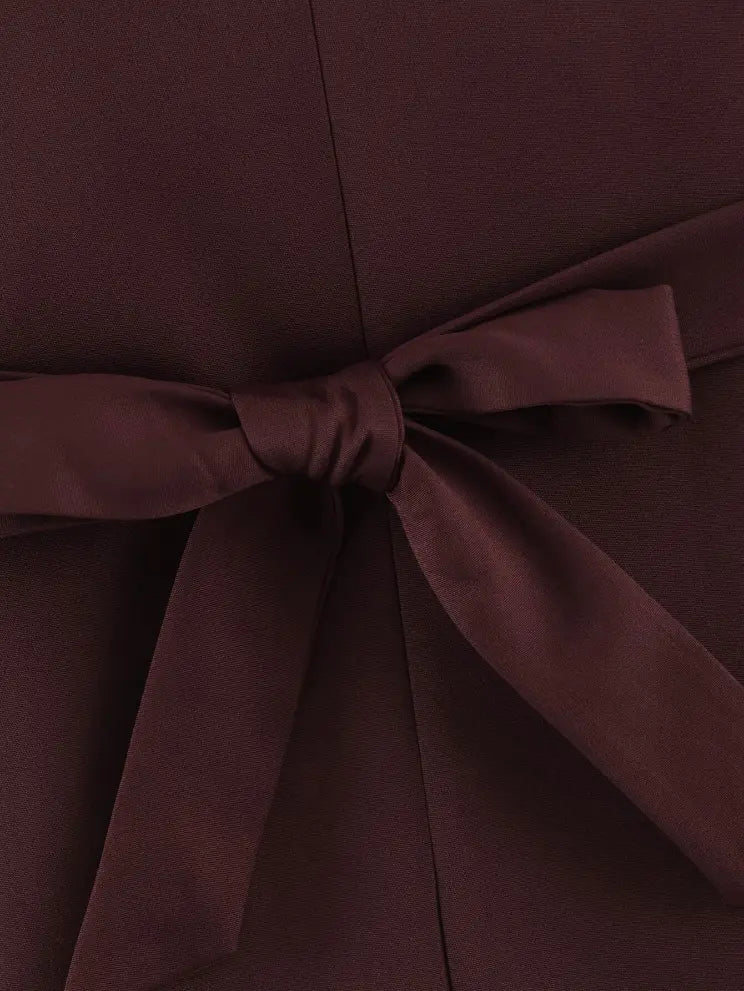 Macro close-up of back self-tie bow belt