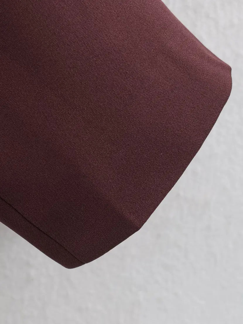 Close-up of blazer cuff and hem finish