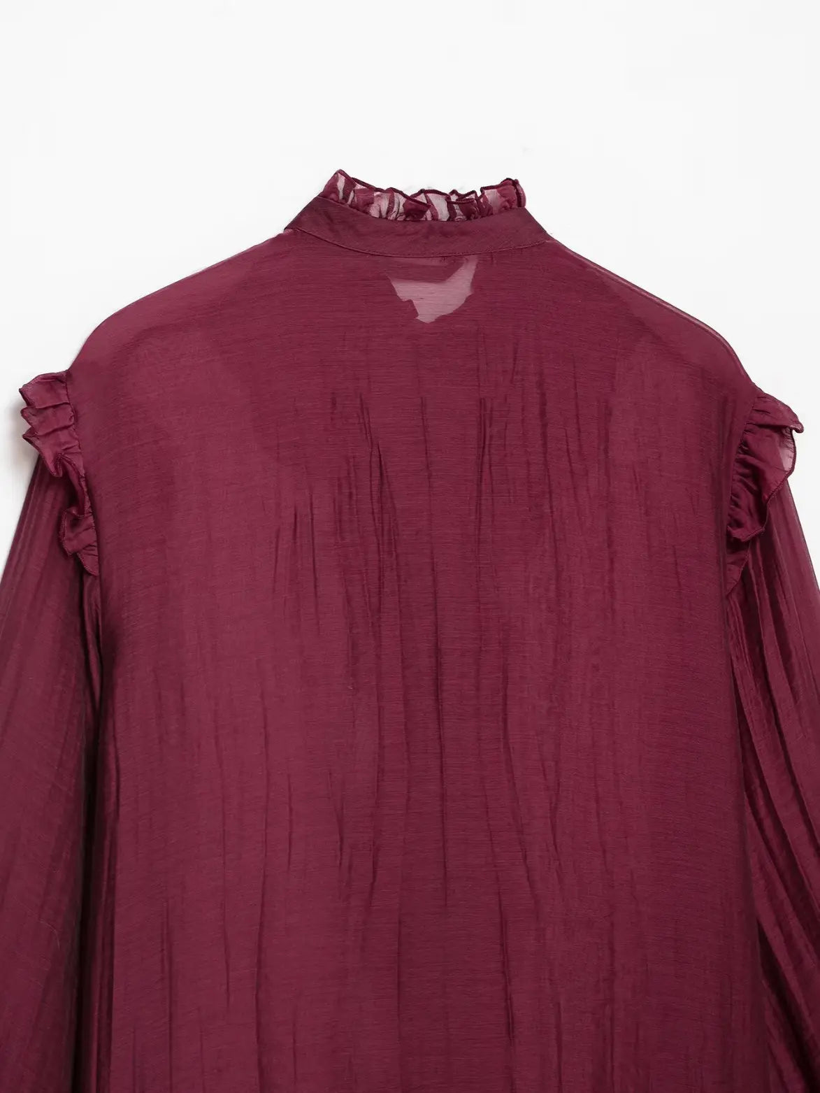 Close-up of back neck and shoulder ruffle