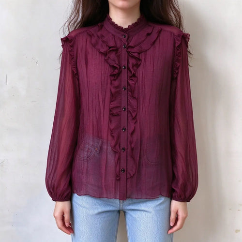 Model wearing burgundy ruffle stand collar balloon sleeve blouse with jeans, front view