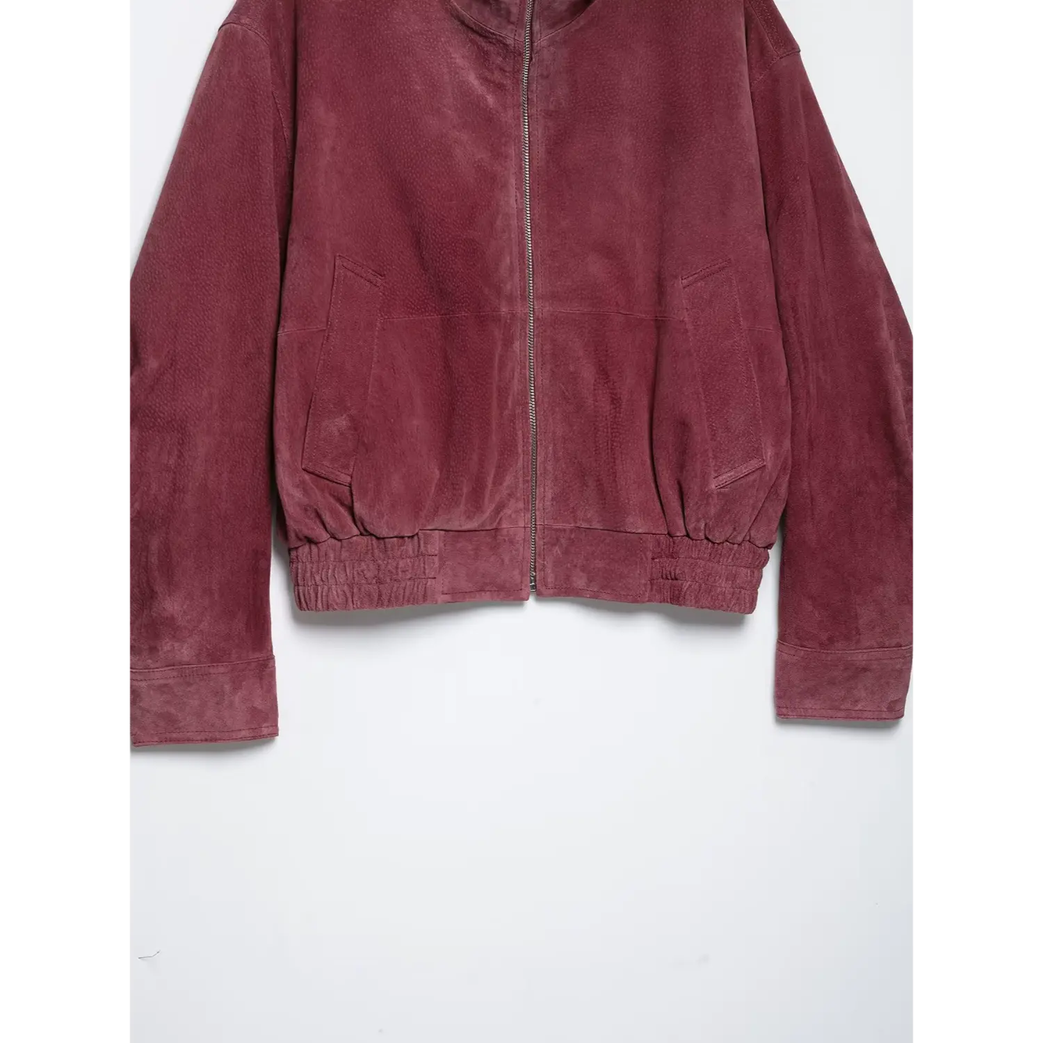 Mid shot full front burgundy suede cropped bomber jacket elasticated waist hem