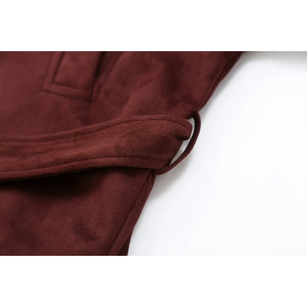 Close-up of self tie belt and cropped hem