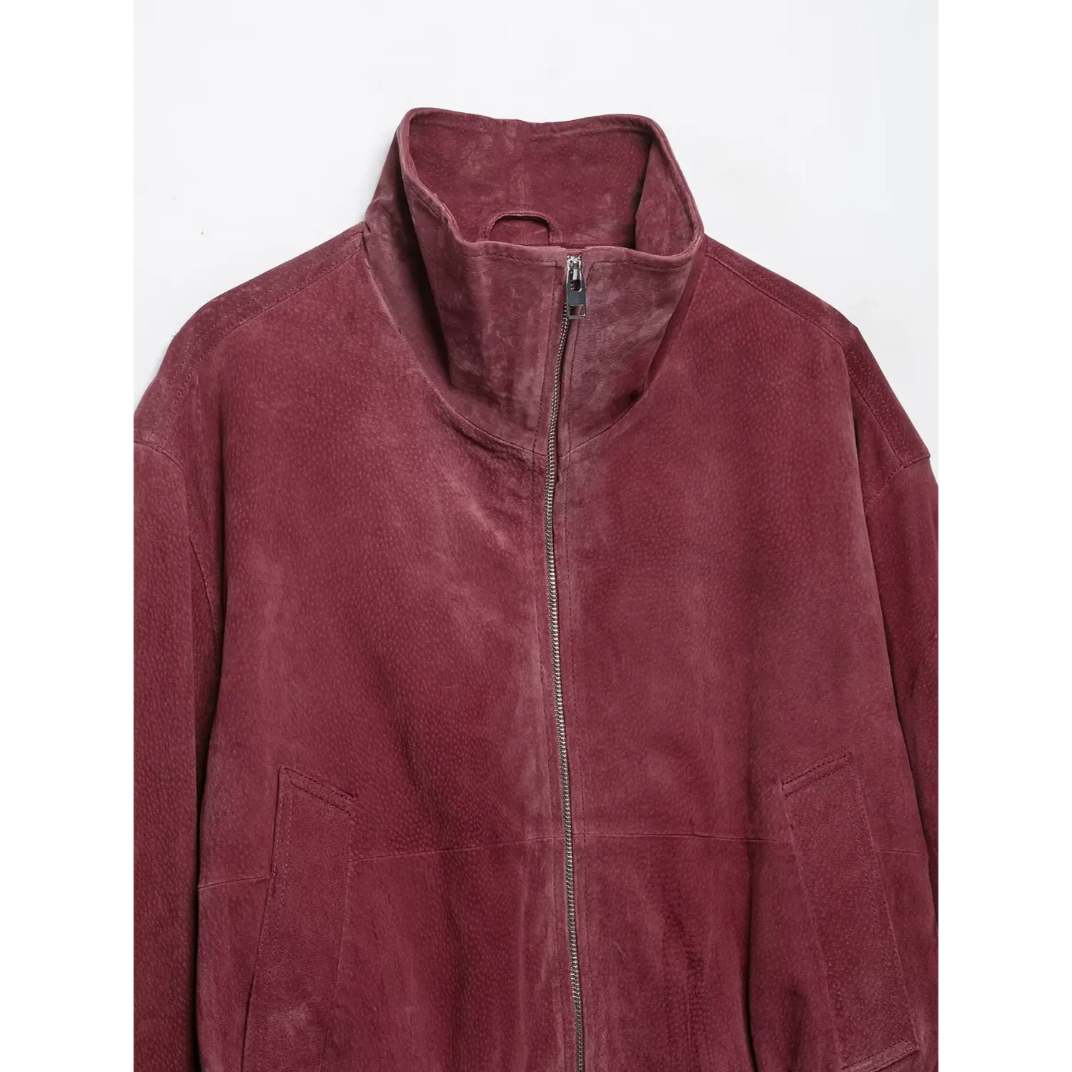 Close-up front zipper and stand collar burgundy suede bomber jacket