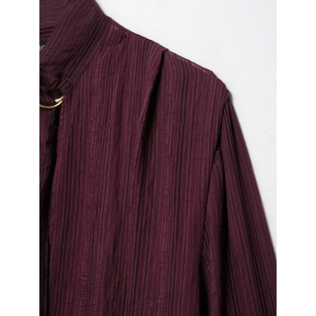Close-up of shoulder pleat detail