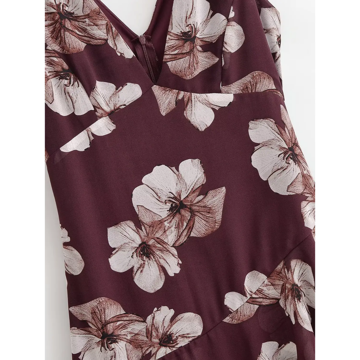 Detailed shot of large floral print on dress bodice