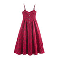 Front full view of burgundy red jacquard cami maxi dress with pearl button decor