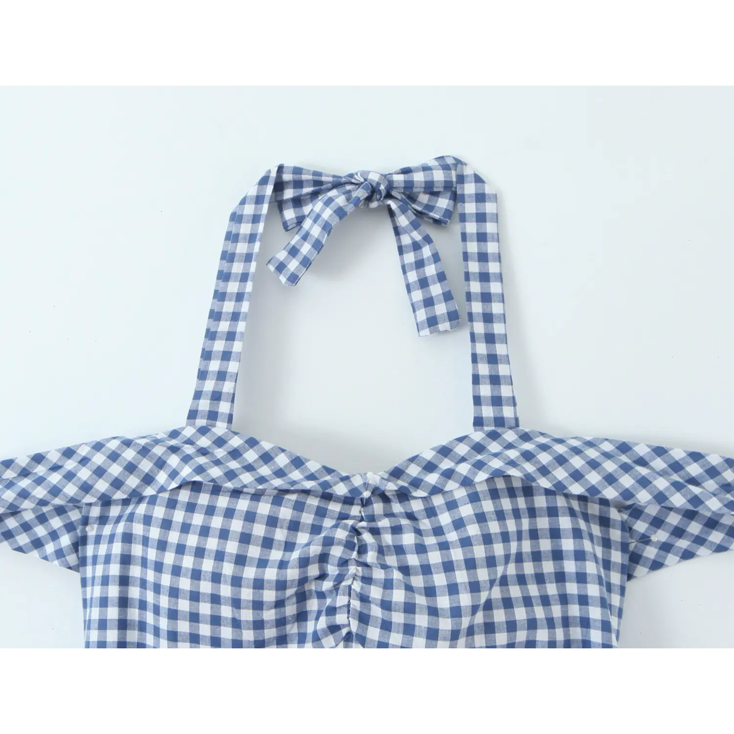 Bust center shirring gingham fabric macro close-up, even tight gathering bust shaping no offset check print smooth shoulder bust seam craft shot