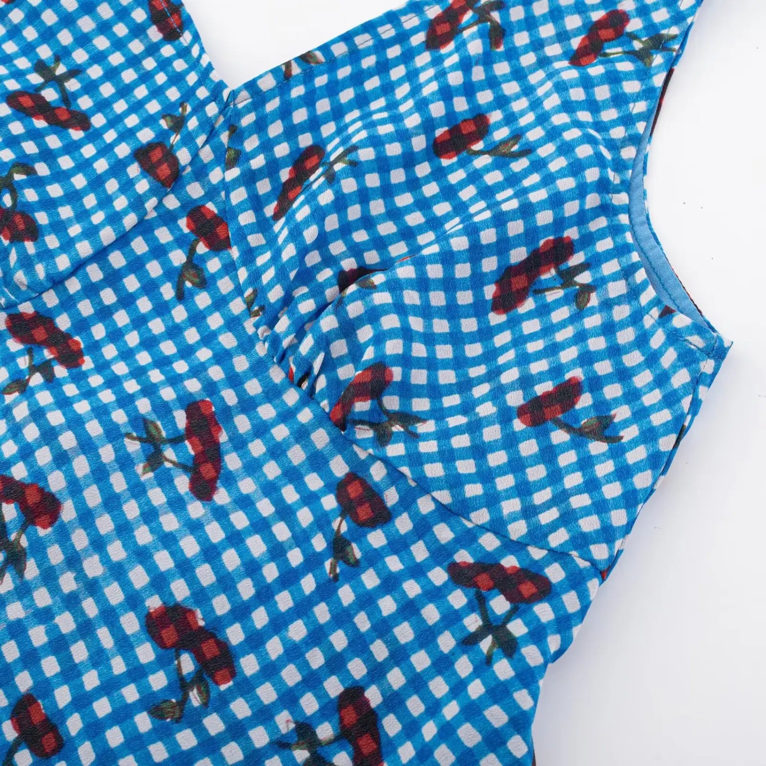 Bust waist gather joint flat shot, cross wrap bust layered gathers full blue gingham cherry print fabric upper silhouette display