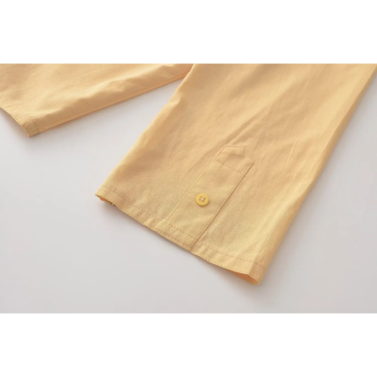 Close-up of sleeve cuff button