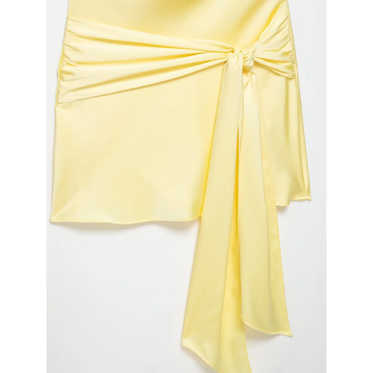 Close-up of waist tie knot and sash