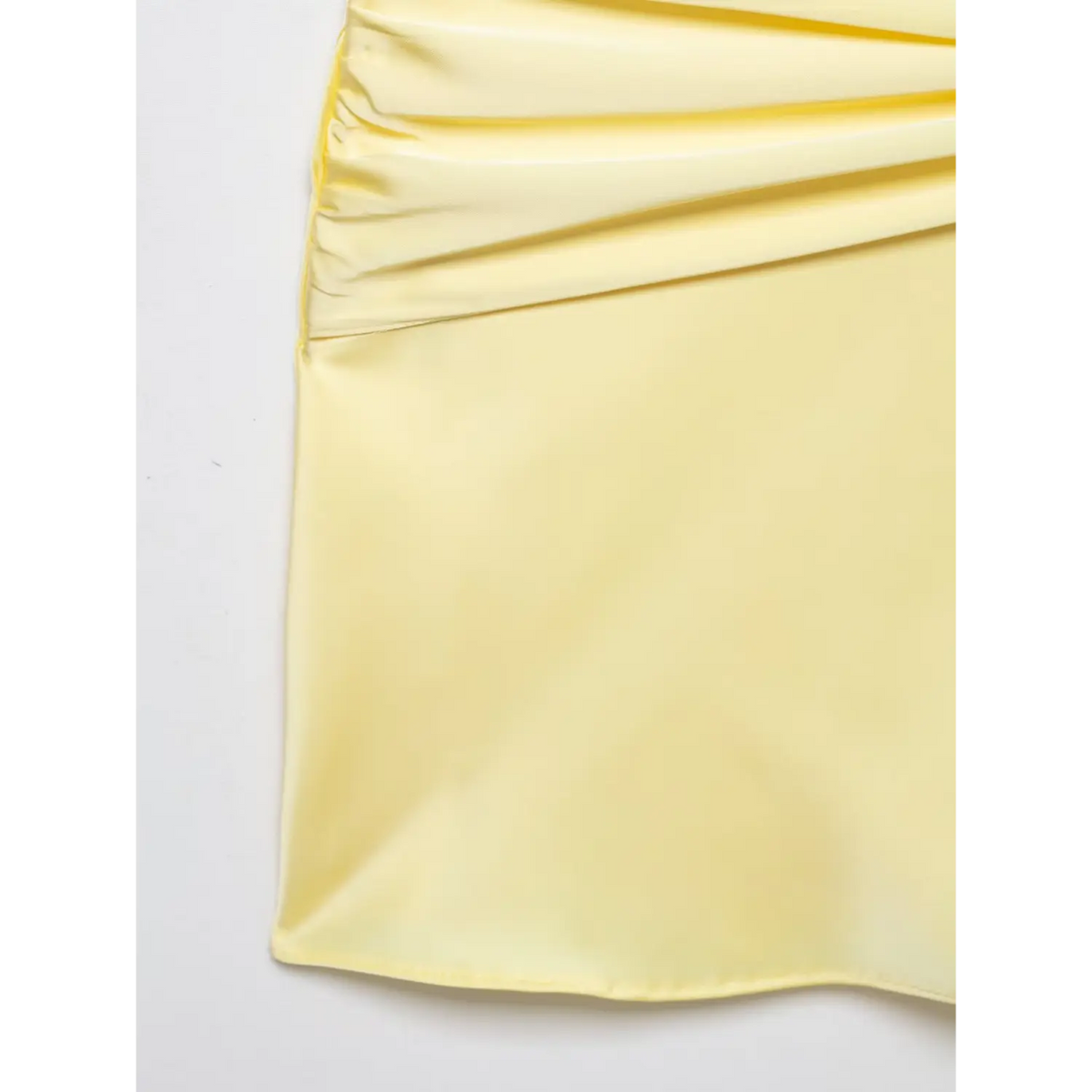 Close-up of tie waist and ruched detail