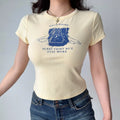 Butter yellow starry window graphic slim crop t shirt, soft stretch round neck short sleeve everyday vintage cropped top