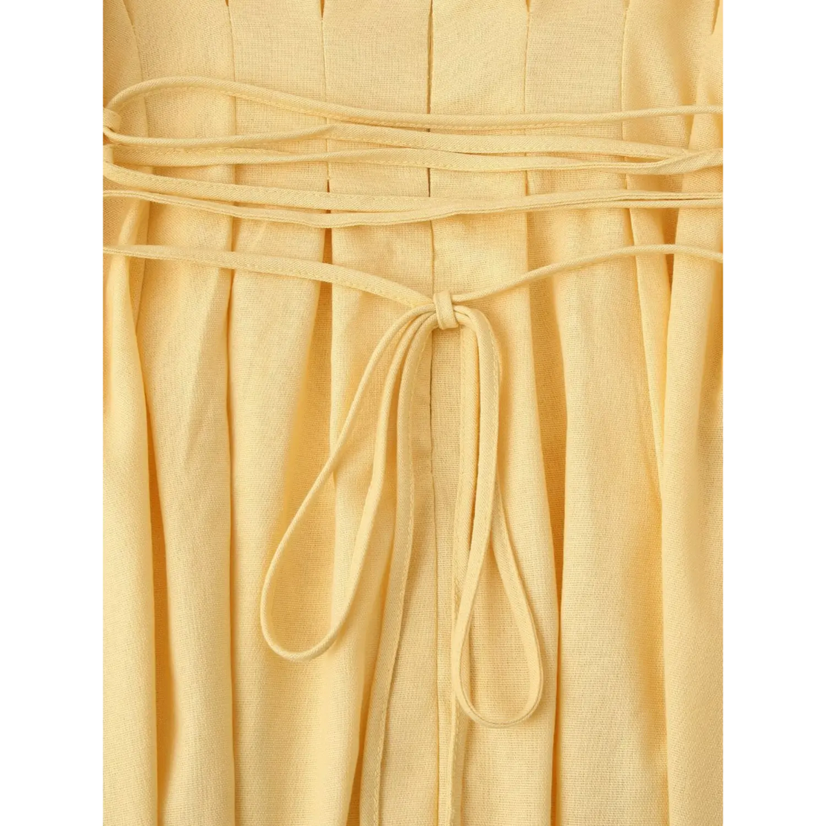 Close-up of multiple tie strings and back knot