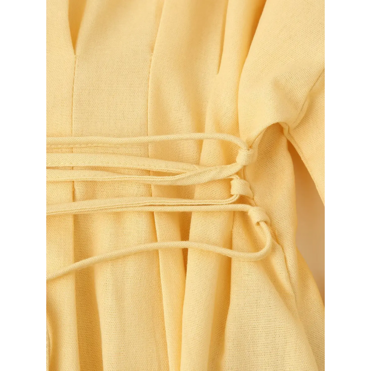 Close-up of side waist tie strings