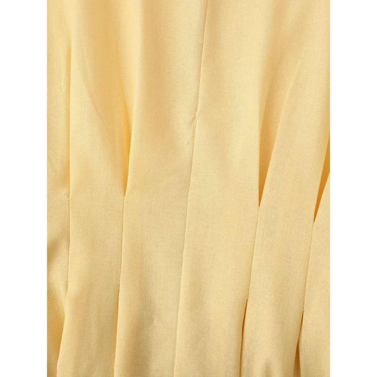 Close-up of waist pleats