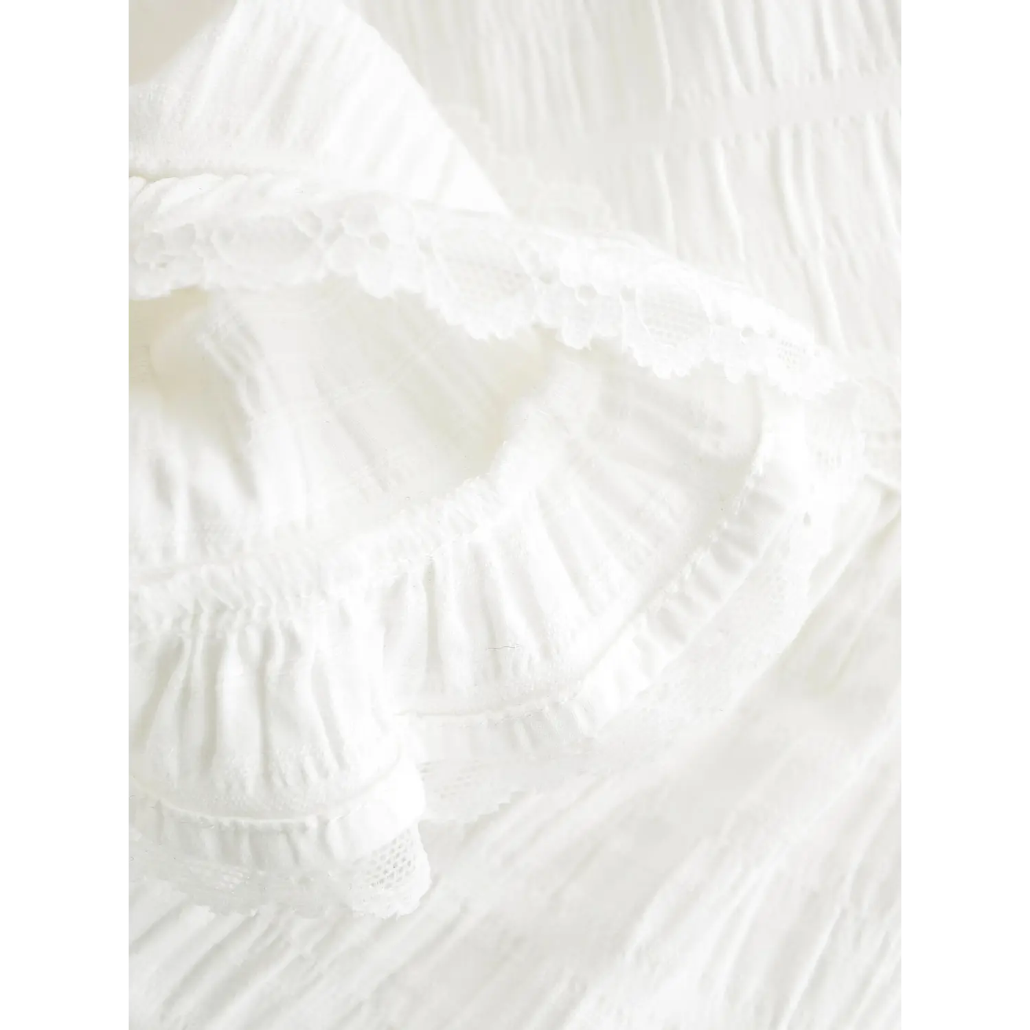 Layered cake skirt gathered fabric texture macro close-up, 3D diamond crinkle fabric natural fluffy drape soft breathable fabric touch shot