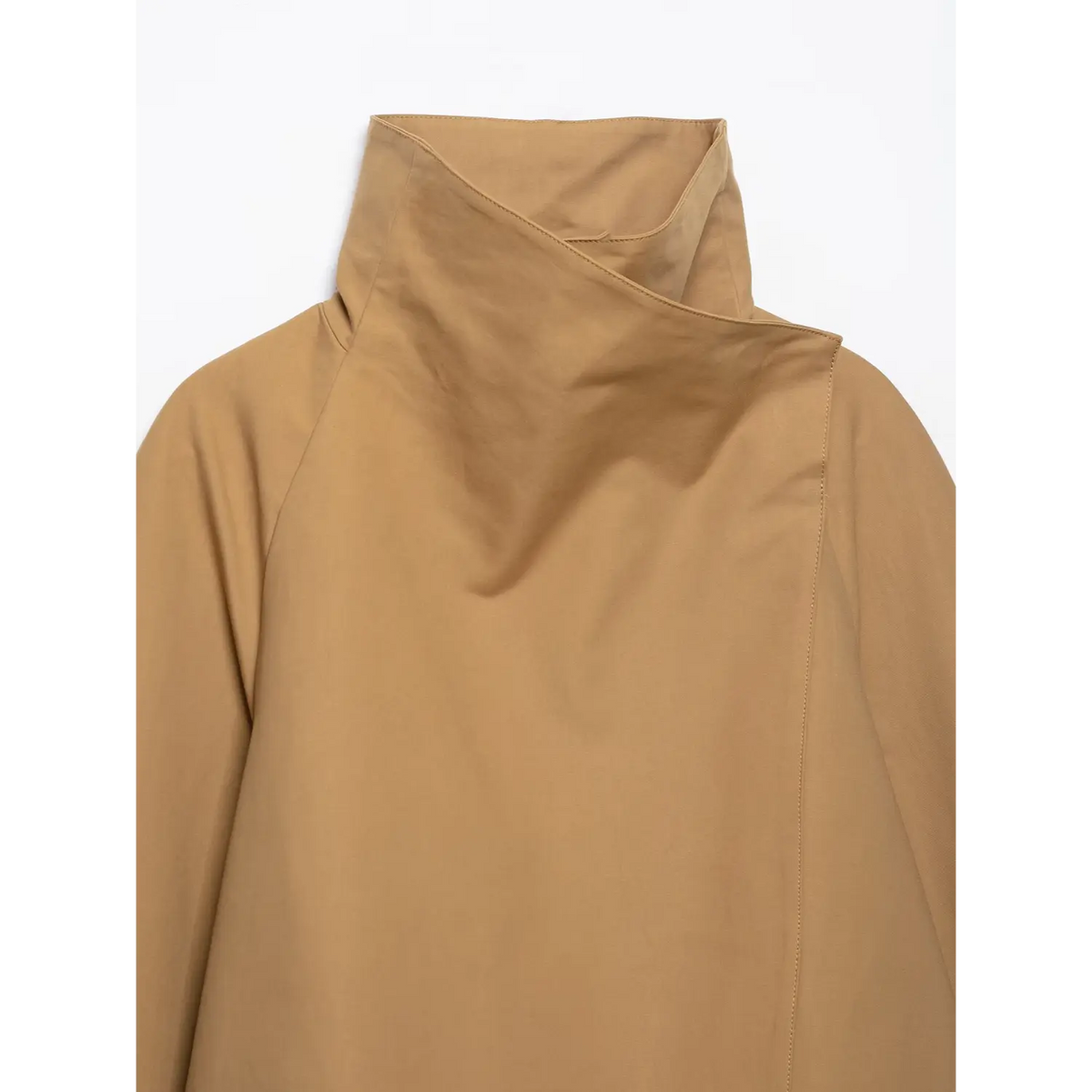 Upper front closeup of camel cropped jacket, unique draped wrap high neck and diagonal seam