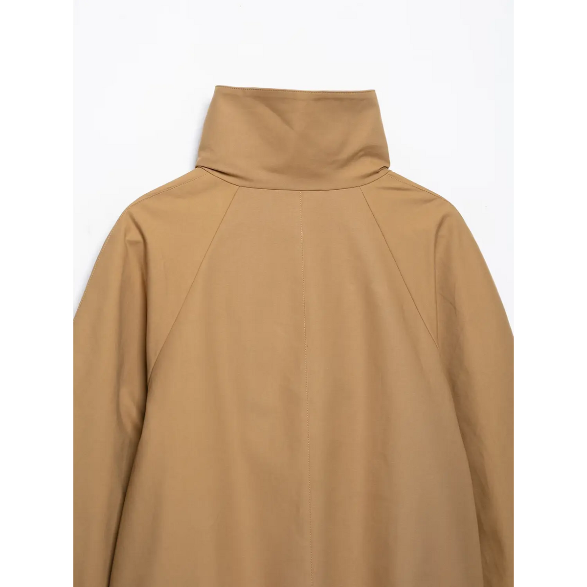 Back upper shot of camel jacket with high stand collar and center back raglan seam details