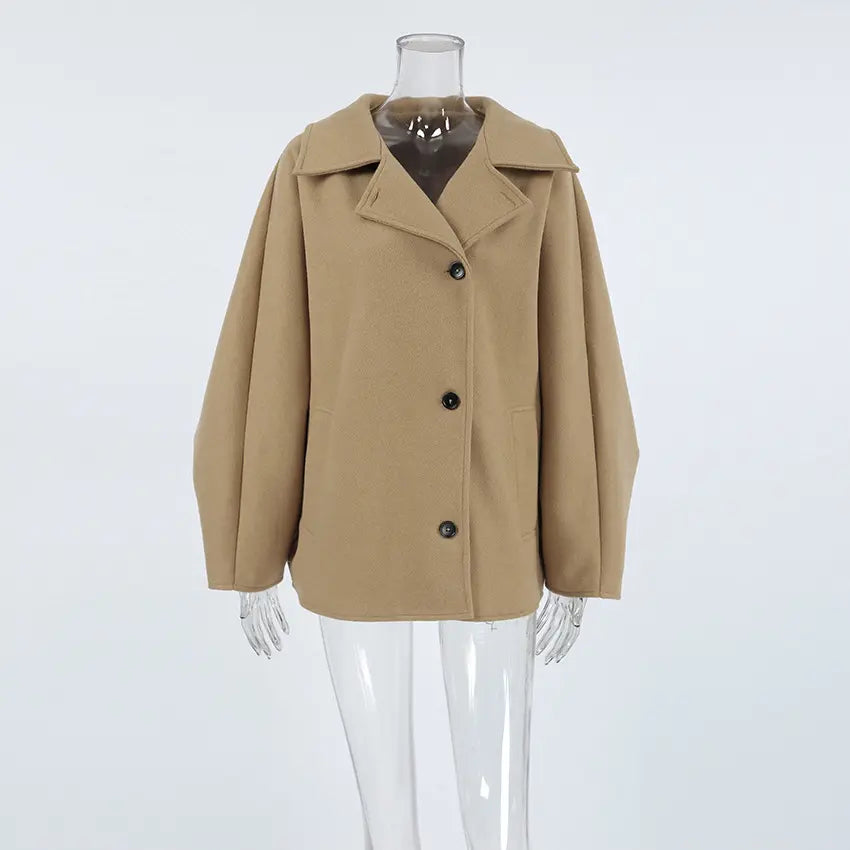 Camel spread collar button front cropped jacket on mannequin, front angle view