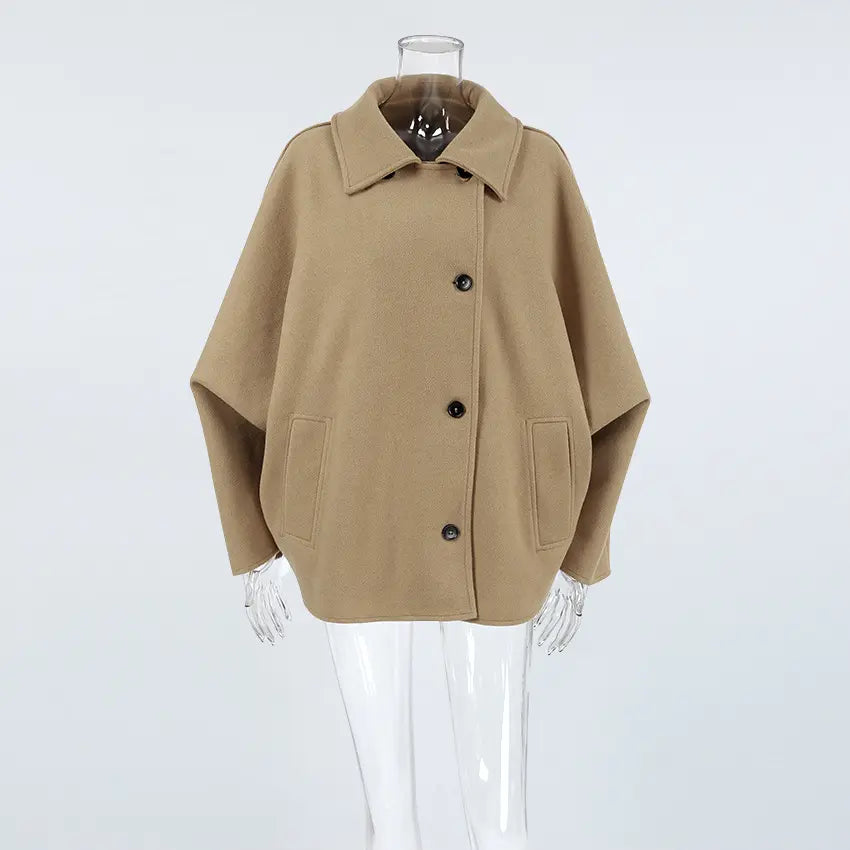Camel spread collar button front cropped jacket on mannequin, front view