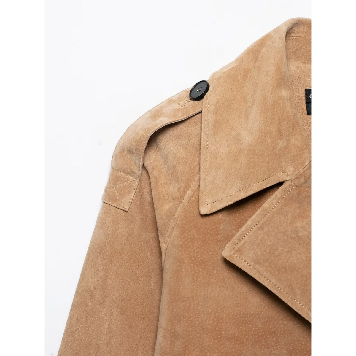 Close-up of wide notched lapel and shoulder epaulet button