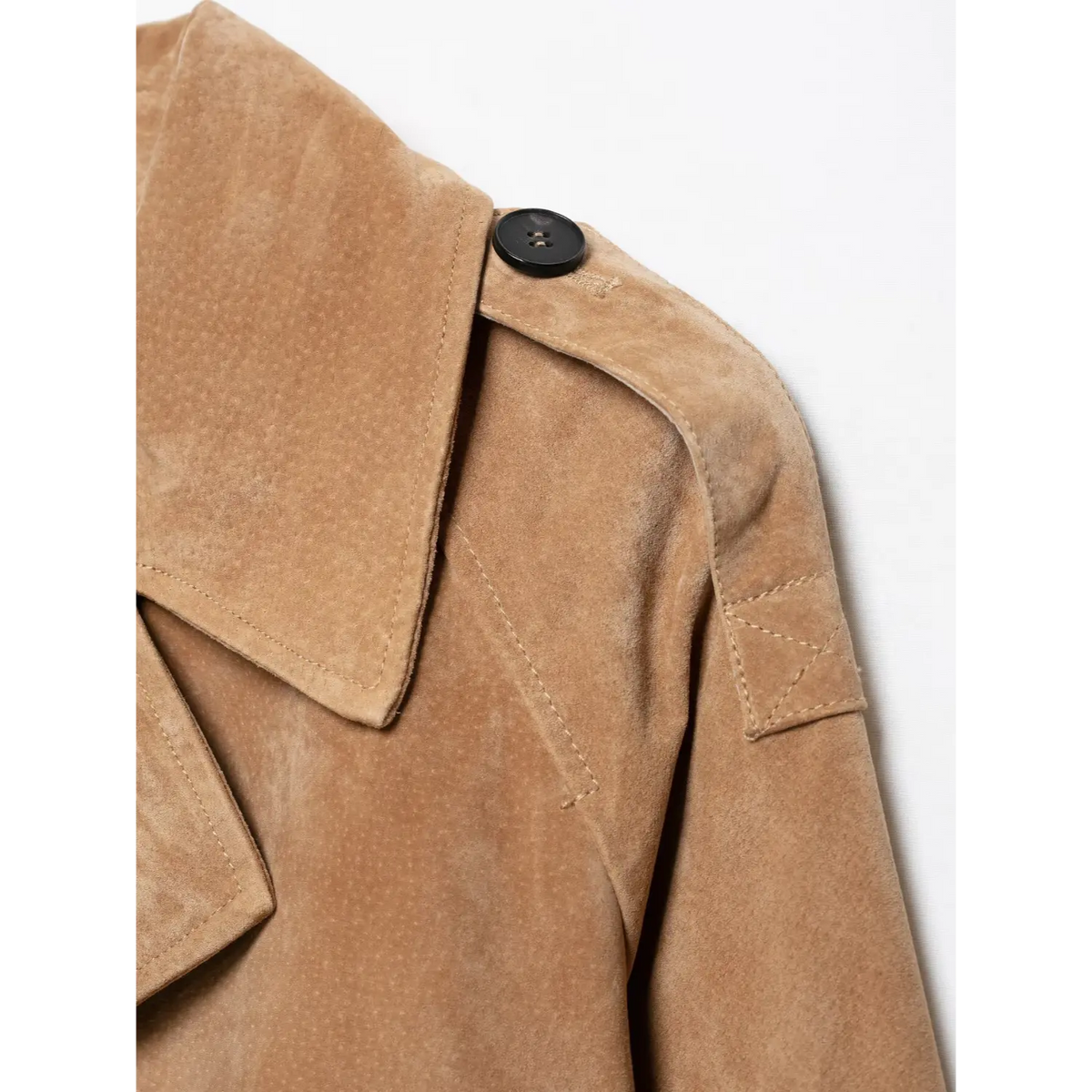 Close-up of shoulder epaulet and black button