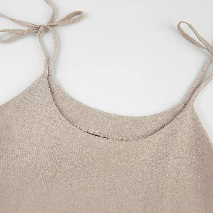Close-up of V neckline and tie shoulder straps