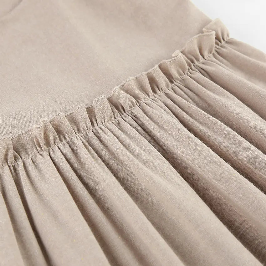 Close-up of ruffled elastic smocked waist