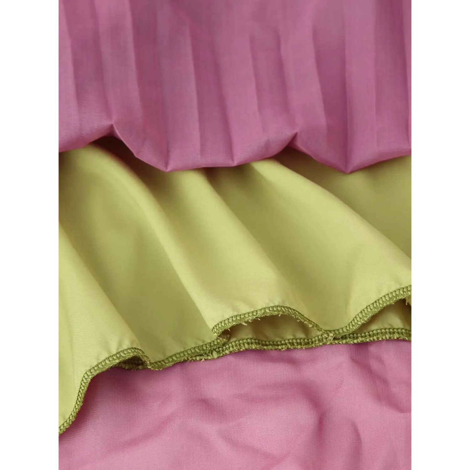 Inner lining fabric stitching detail of ombre layered pleated long dress