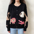 Model wearing cartoon animal intarsia knit cardigan front
