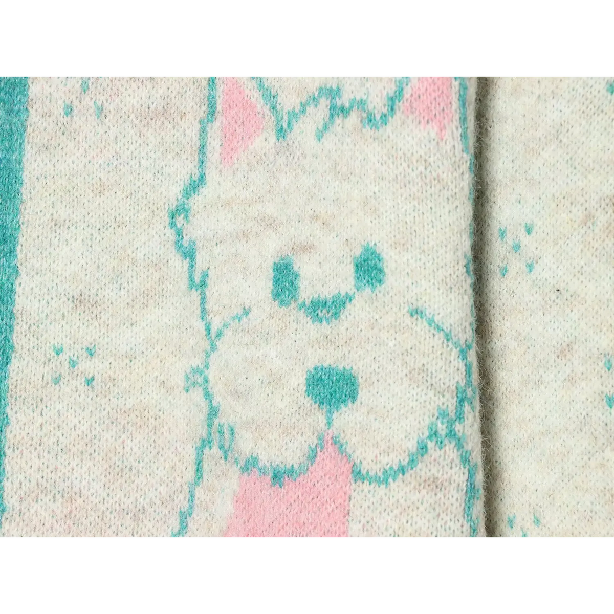 Close-up of cartoon dog intarsia face