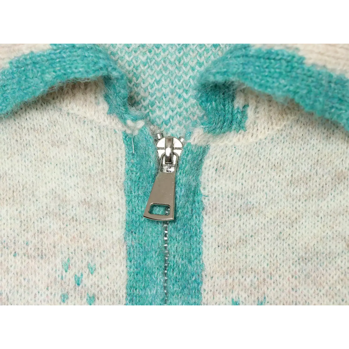 Close-up of metal zipper pull