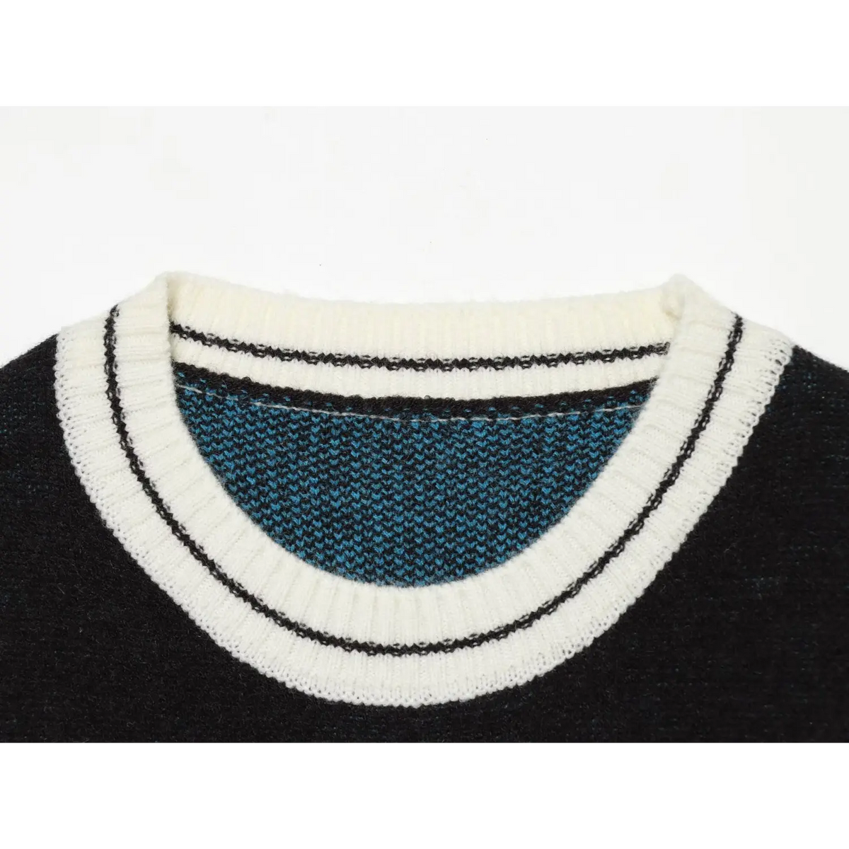 Close-up of crew neck ribbed trim and knit texture