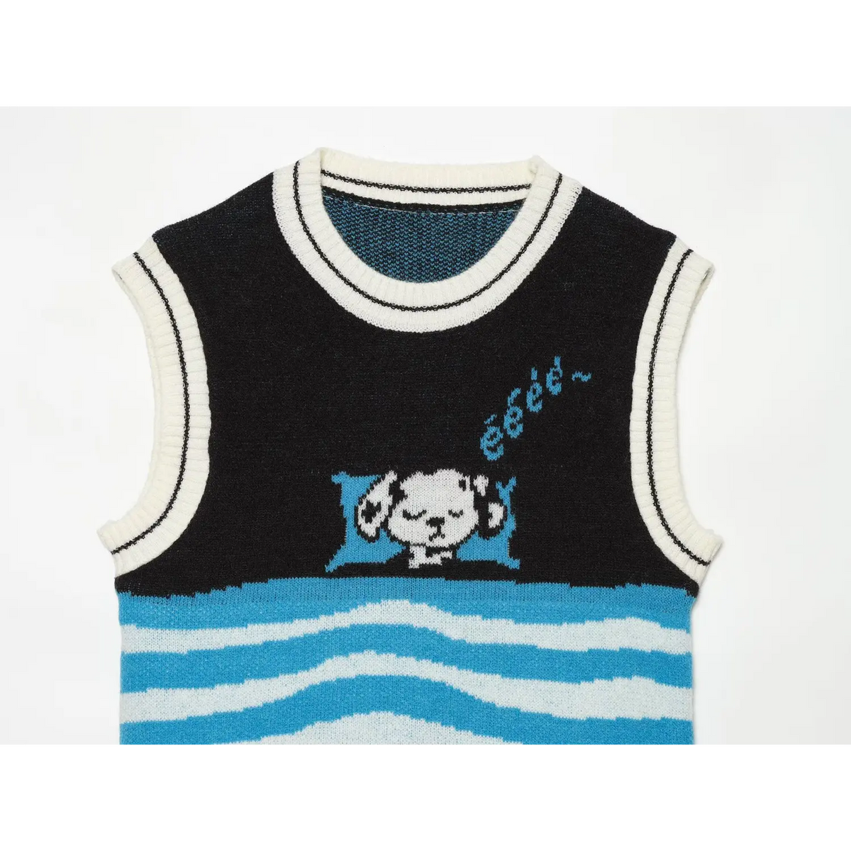 Close-up of cartoon dog intarsia and wavy stripe panel