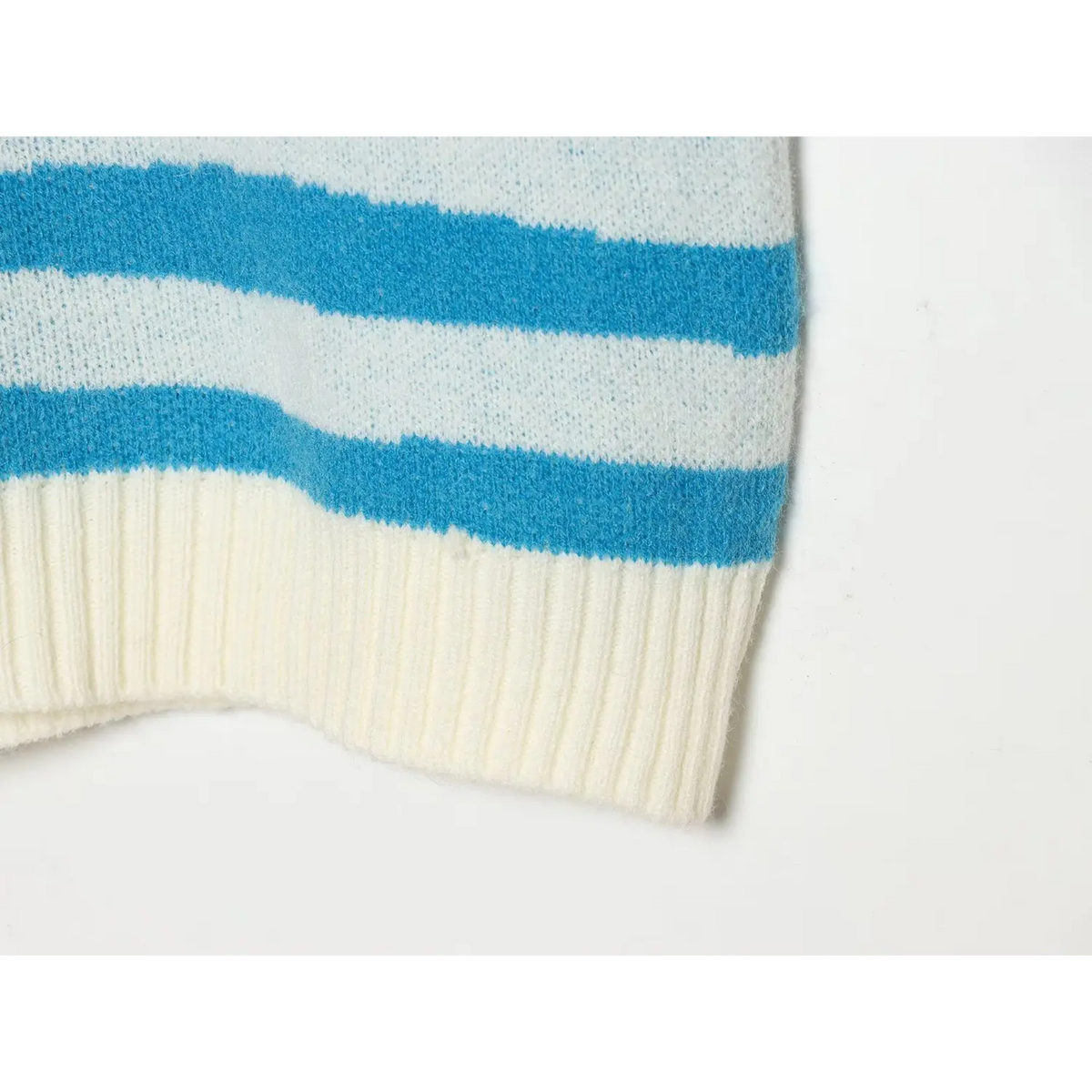 Close-up of wavy stripe and ribbed hem stitching