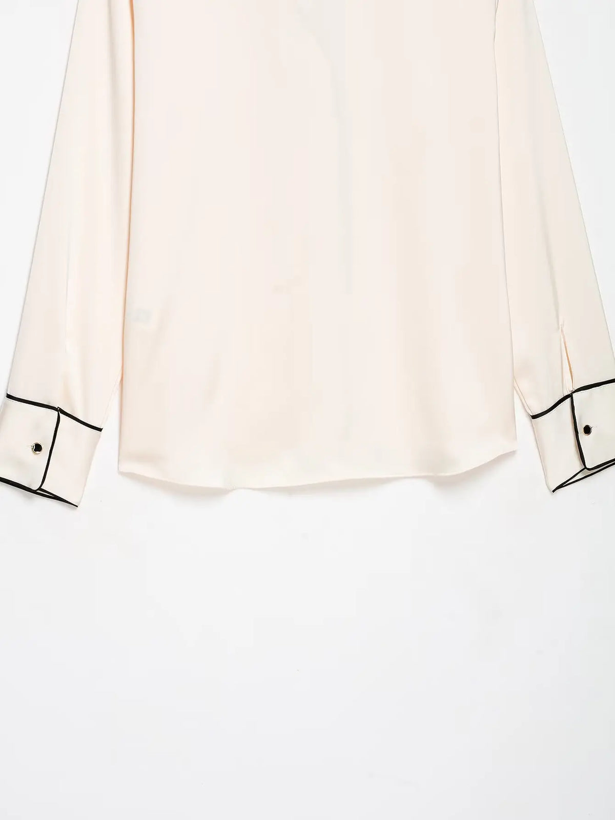 Close-up of back hem and cuffs