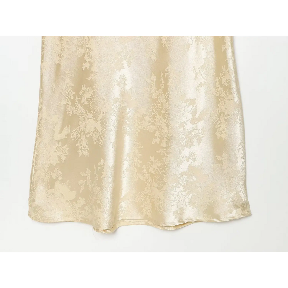 Close-up of flowing skirt with all-over floral jacquard