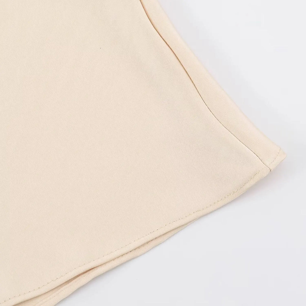 Close-up of stitched rolled hem