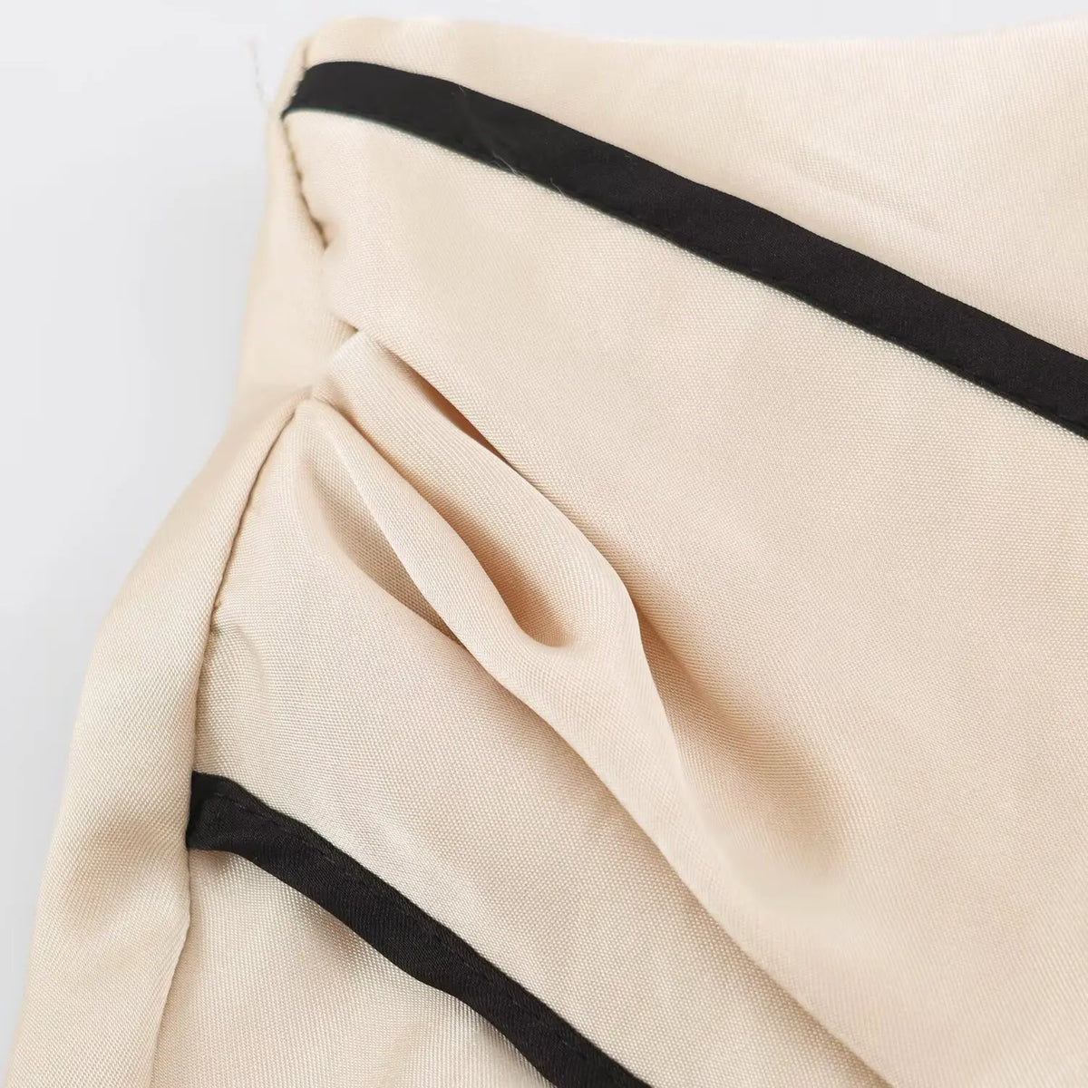 Close-up of gathered side seam