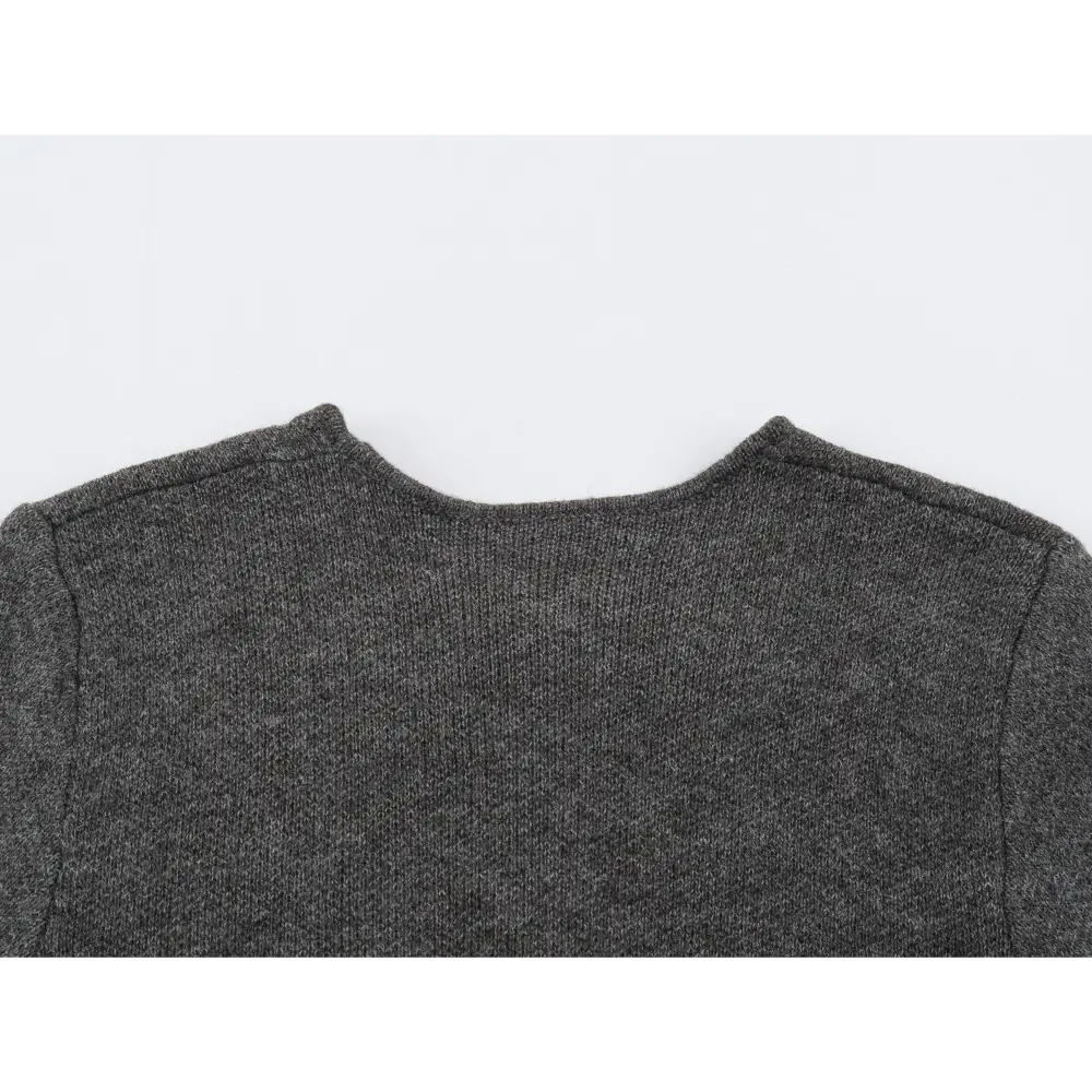 Close-up of back round neckline and shoulder seams