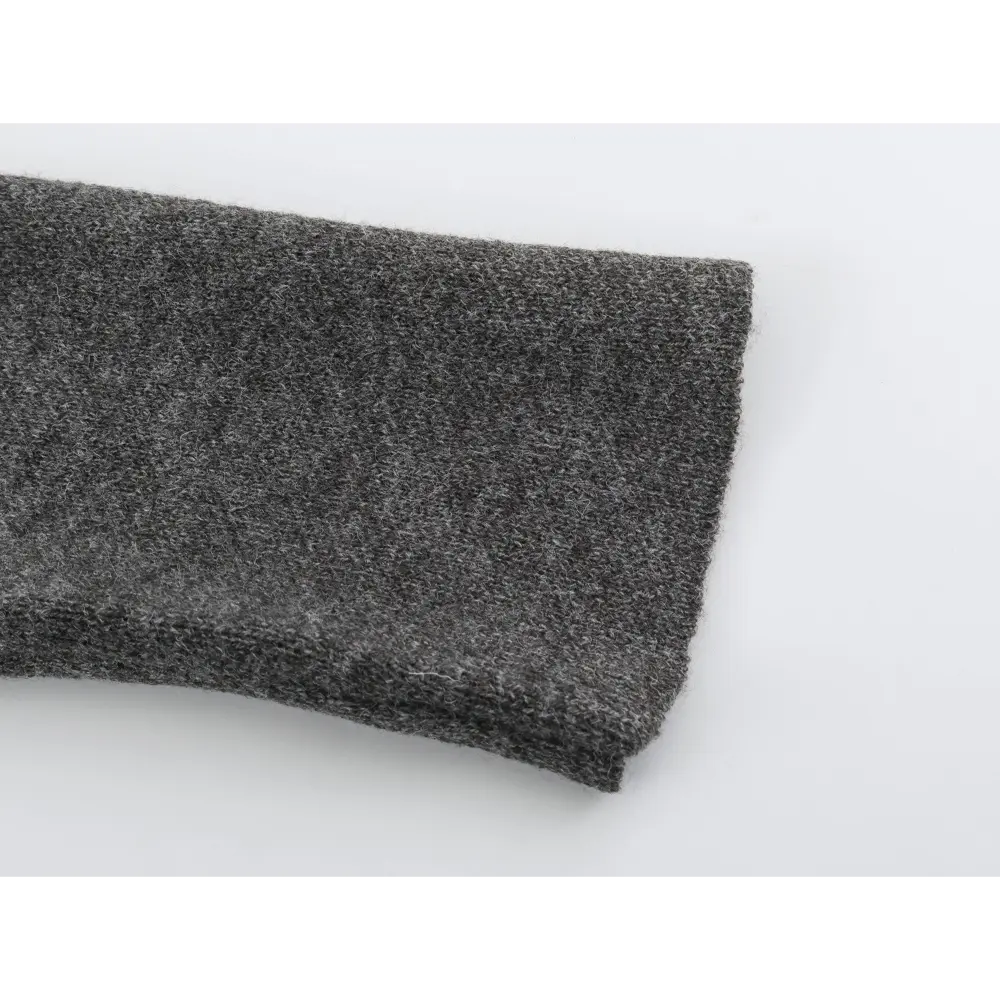 Close-up of long sleeve cuff and knit texture