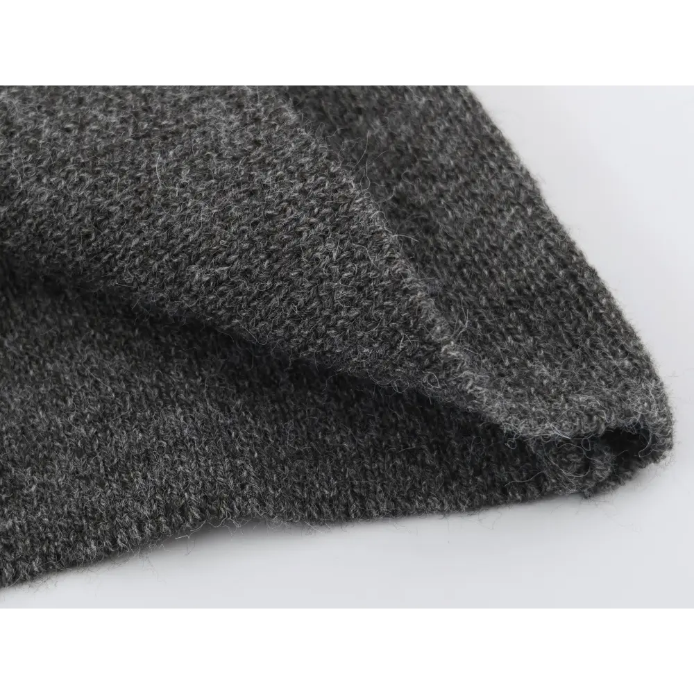 Close-up of folded fuzzy marled knit fabric