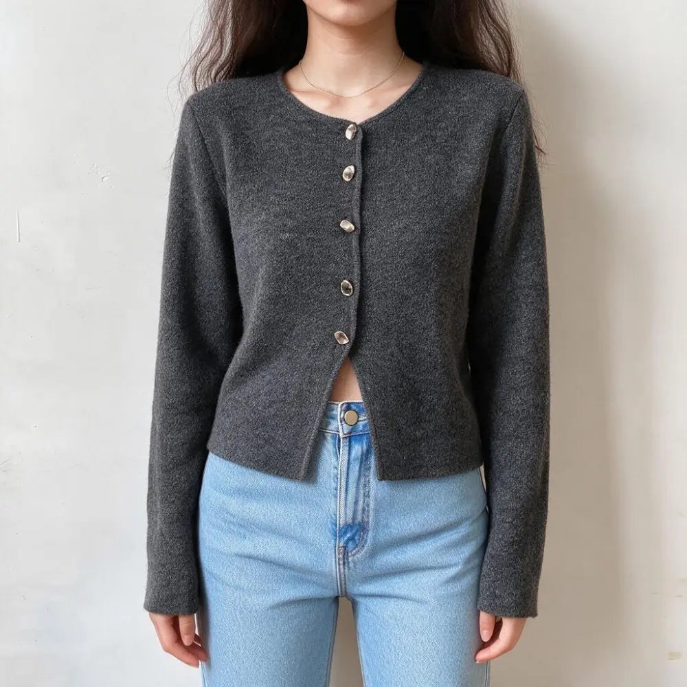 Model wearing charcoal grey metal button knit cardigan, front view