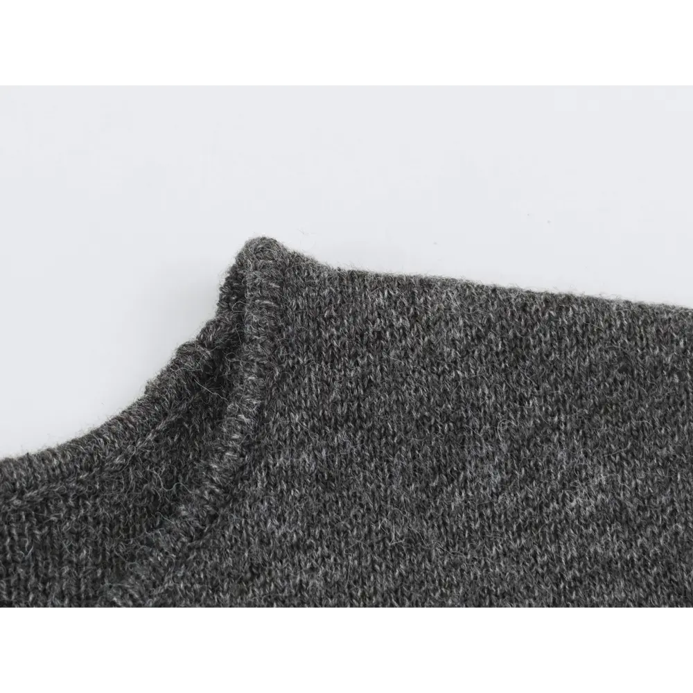 Close-up of shoulder edge and brushed knit stitch