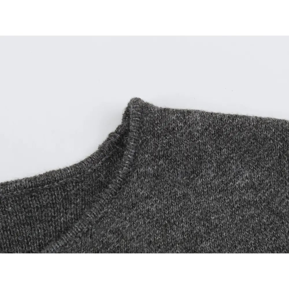 Close-up of shoulder seam and marled knit texture