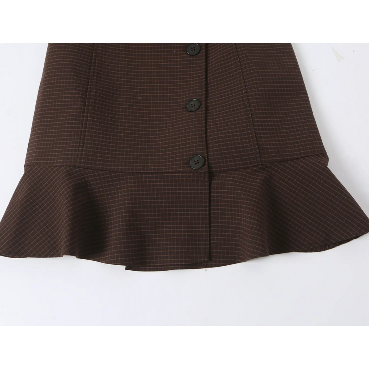 Close-up of ruffle fishtail hem