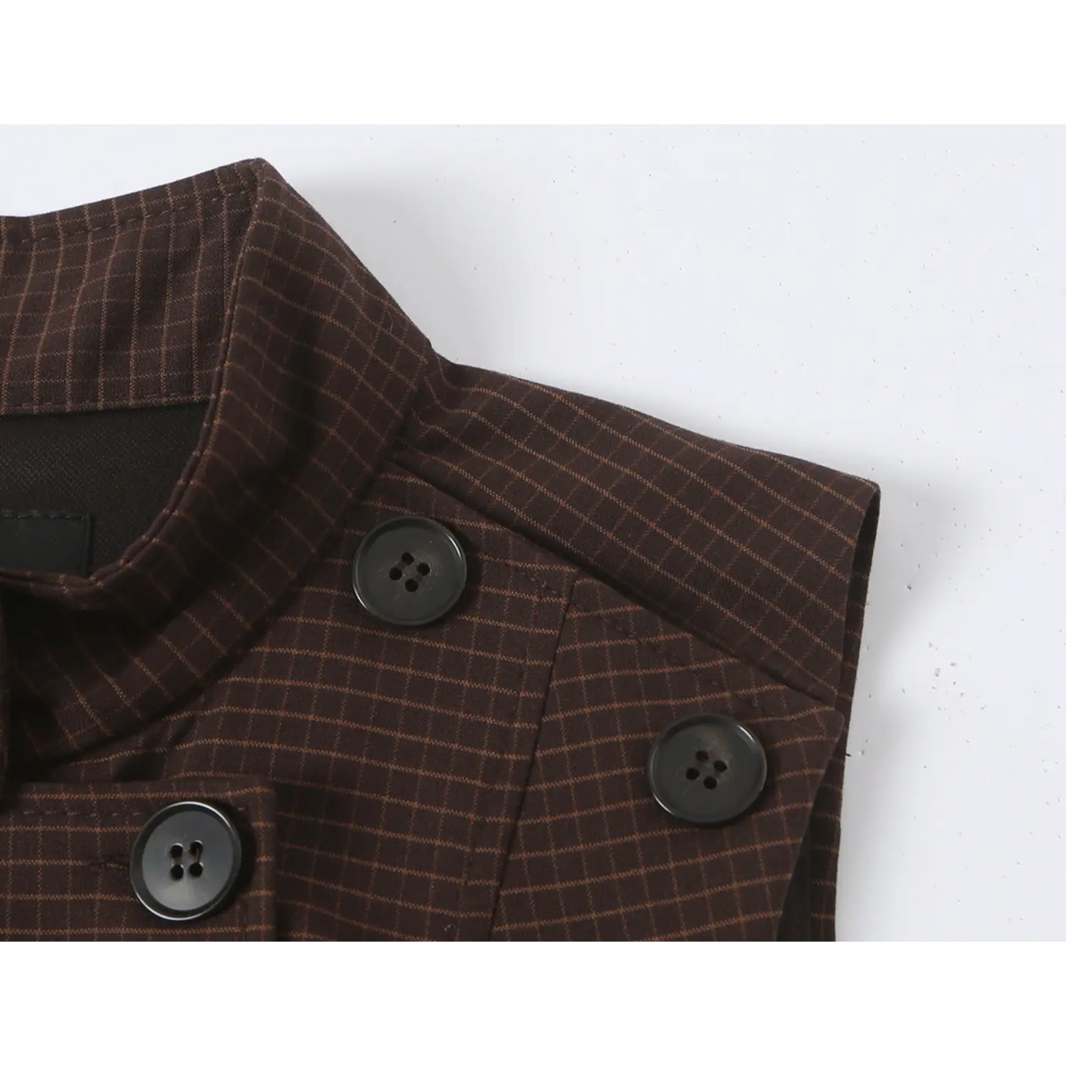 Close-up of decorative shoulder buttons