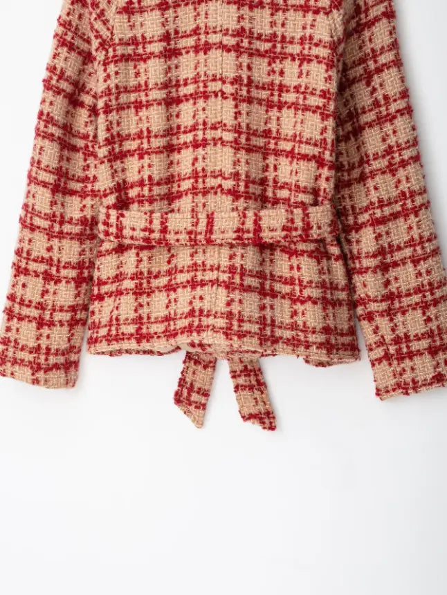 Close-up of back self-tie belt and cropped hem